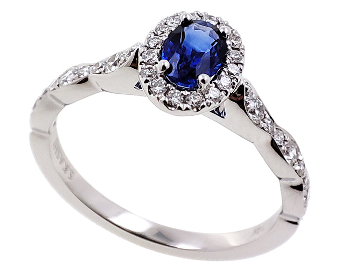 This Gem Stone Ring is available in 14K White Gold. There are a total of 35 stones. There are Rounds with a total carat weight of 0.29 set in a Micro Prong setting.There are Sapphire stones with a total carat weight of 0.66 set in a Micro Prong.