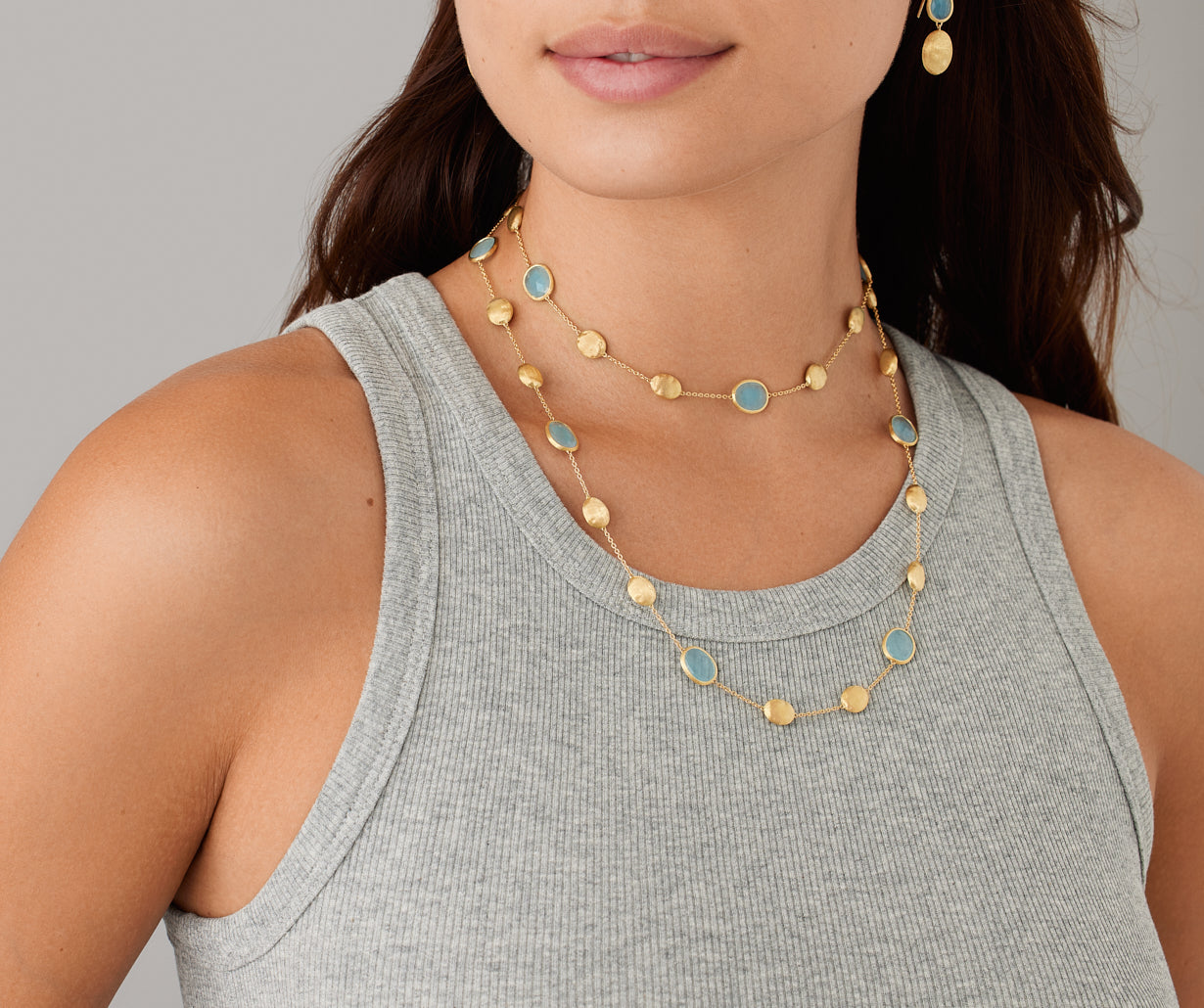 18kt yellow gold long necklace with aquamarines and diamonds