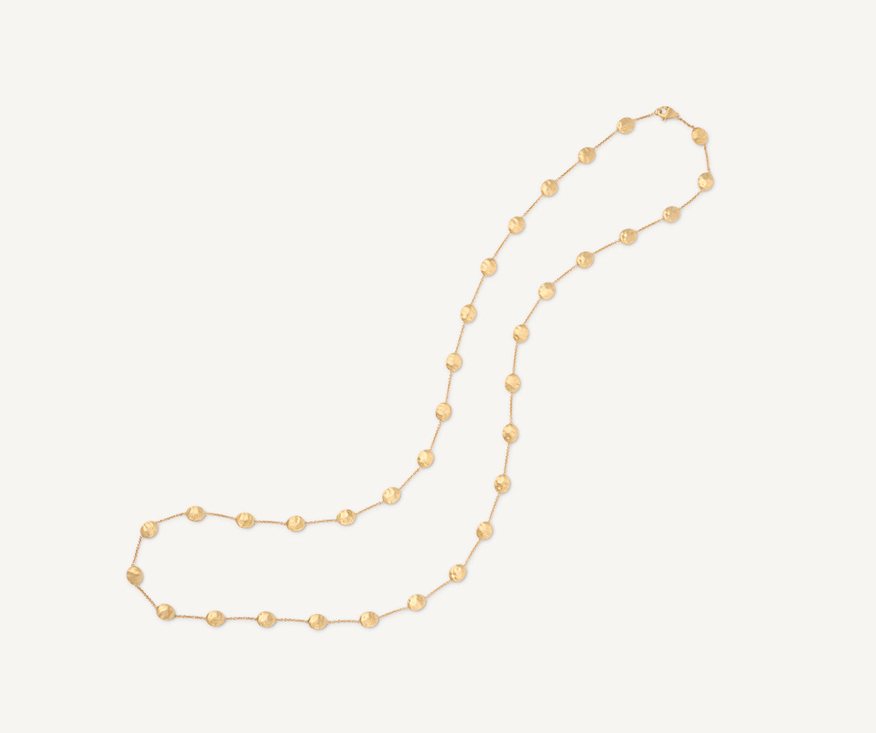 Long necklace with yellow gold oval elements