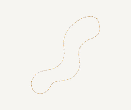 Long necklace with oval elements and diamonds