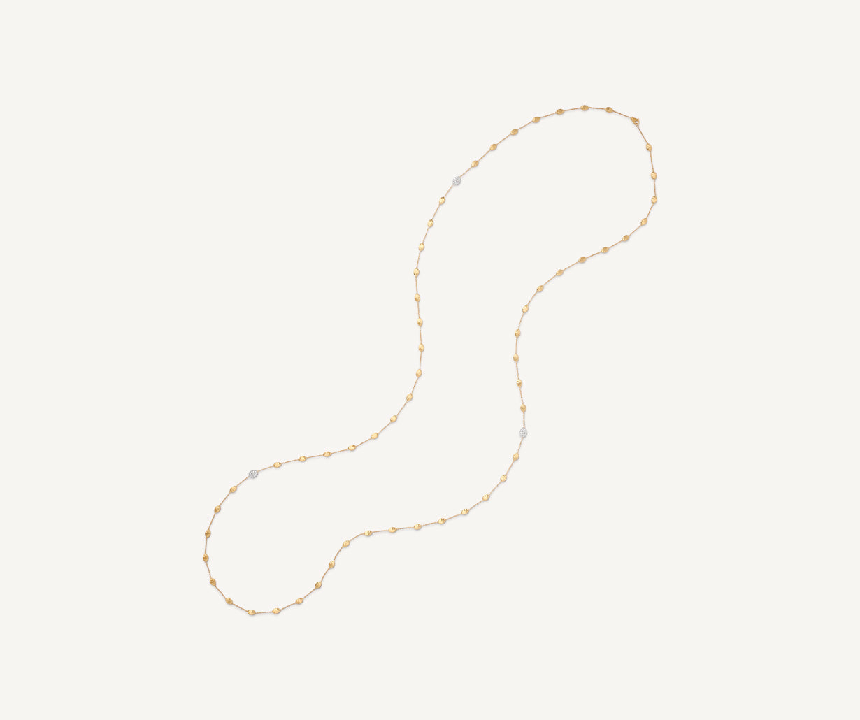 Long necklace with oval elements and diamonds