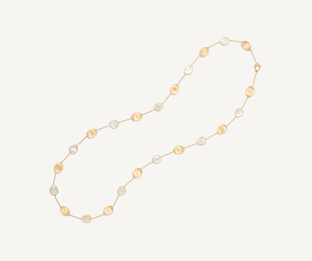 Sautoir with gold leaves and white mother-of-pearl