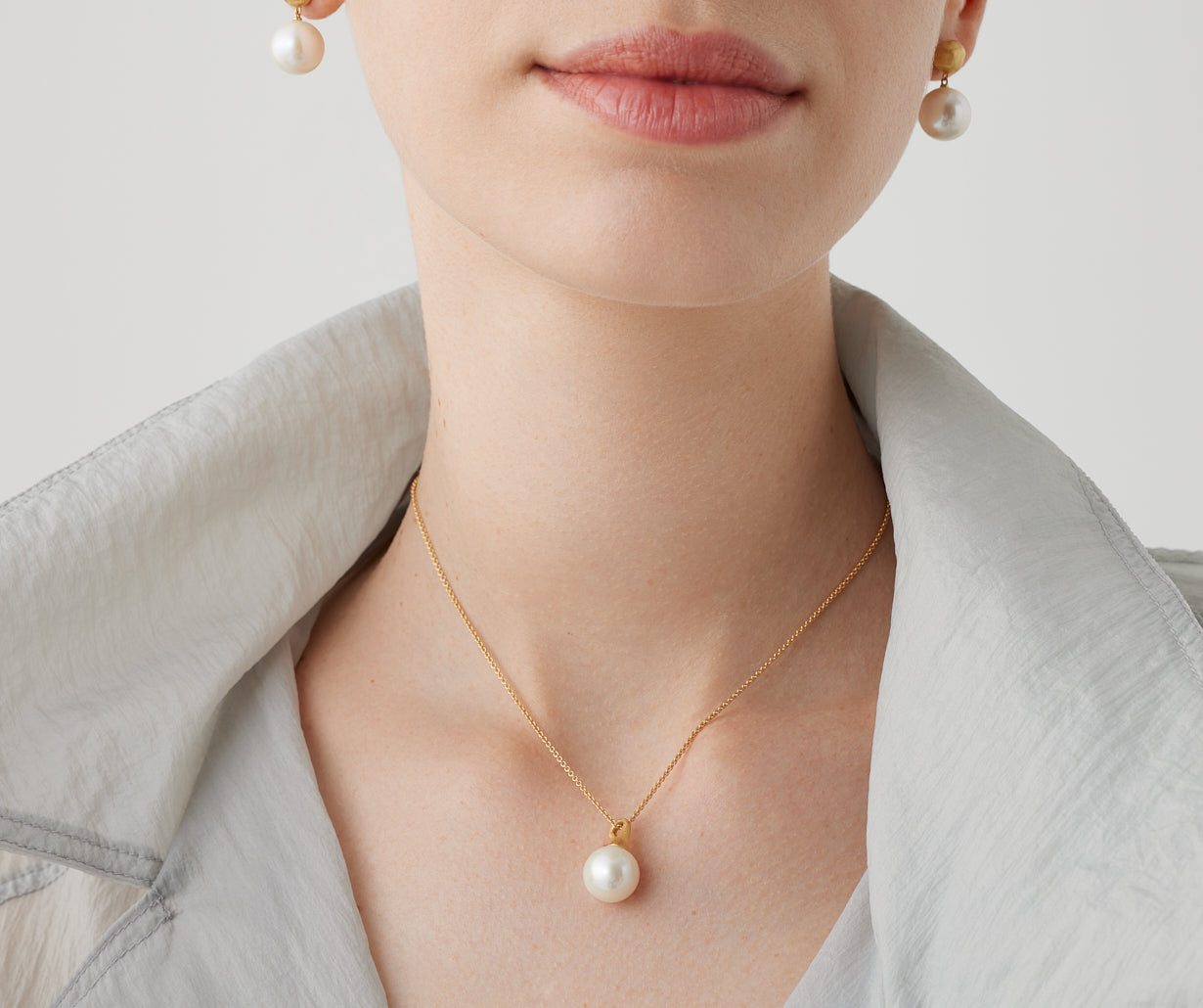 18kt yellow gold pendant with pearl