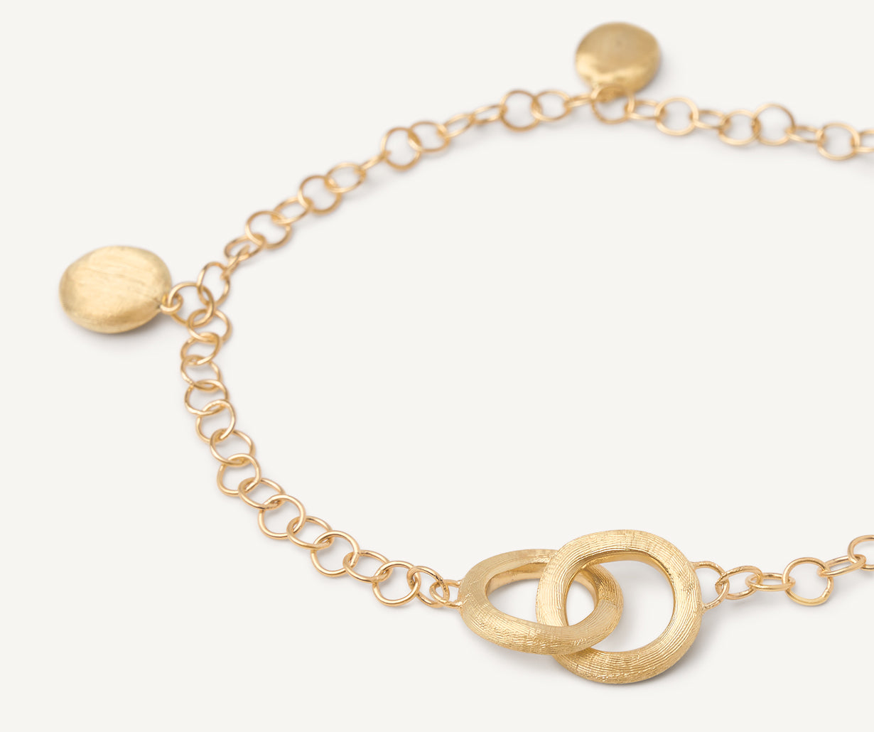 Short gold necklace with charms