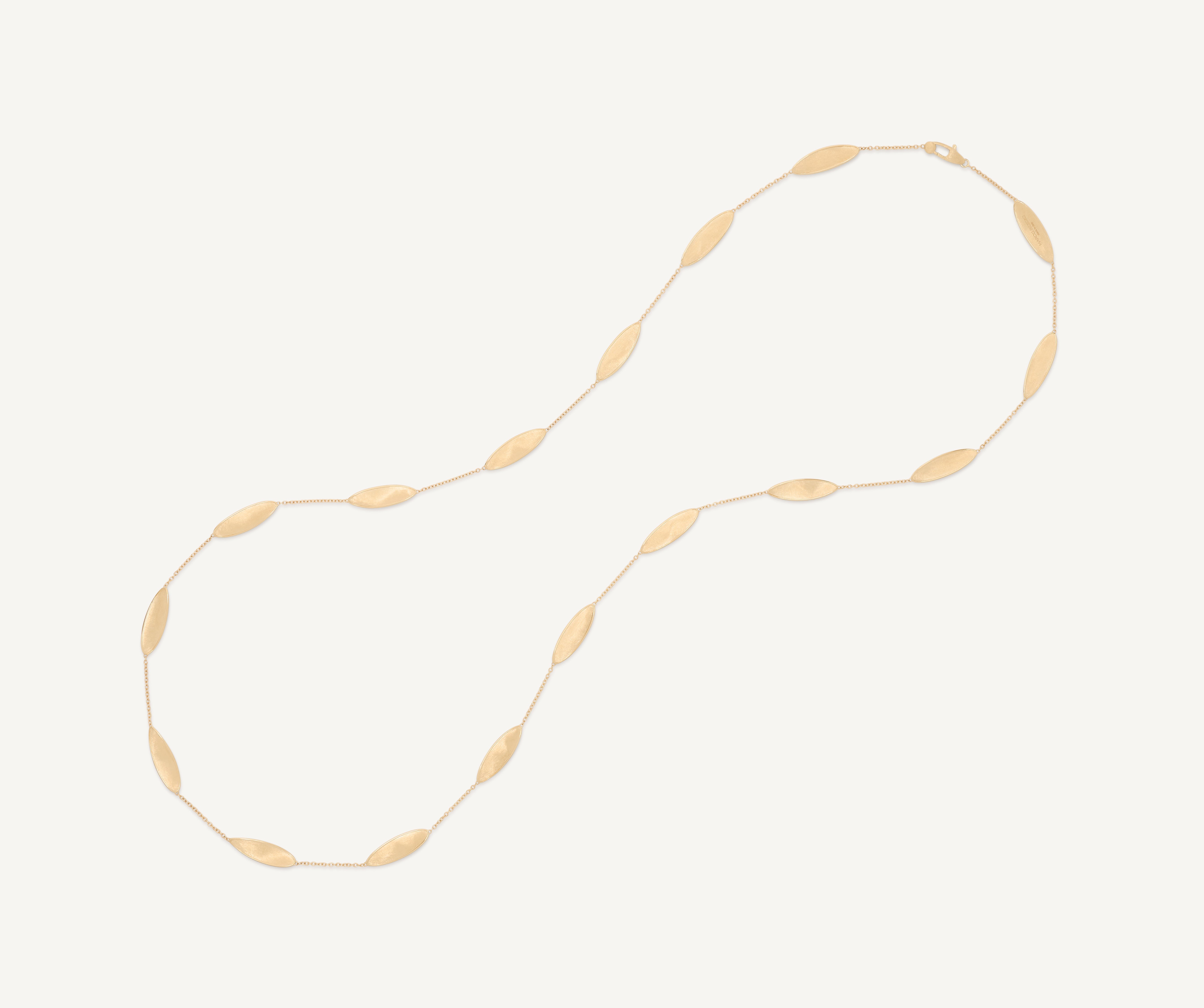 Long necklace with 18kt yellow gold leaves