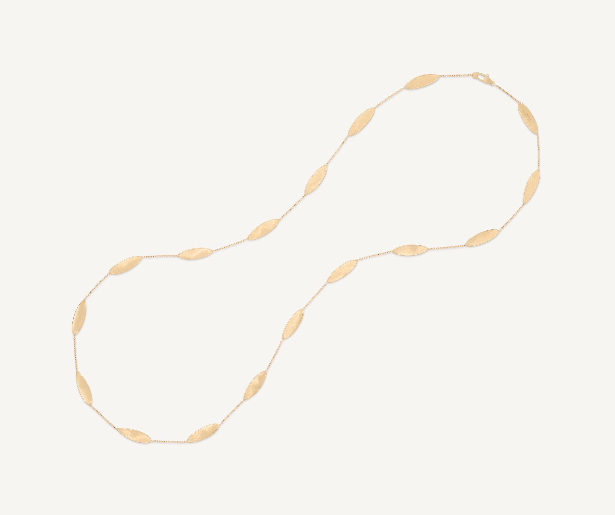 Long necklace with 18kt yellow gold leaves