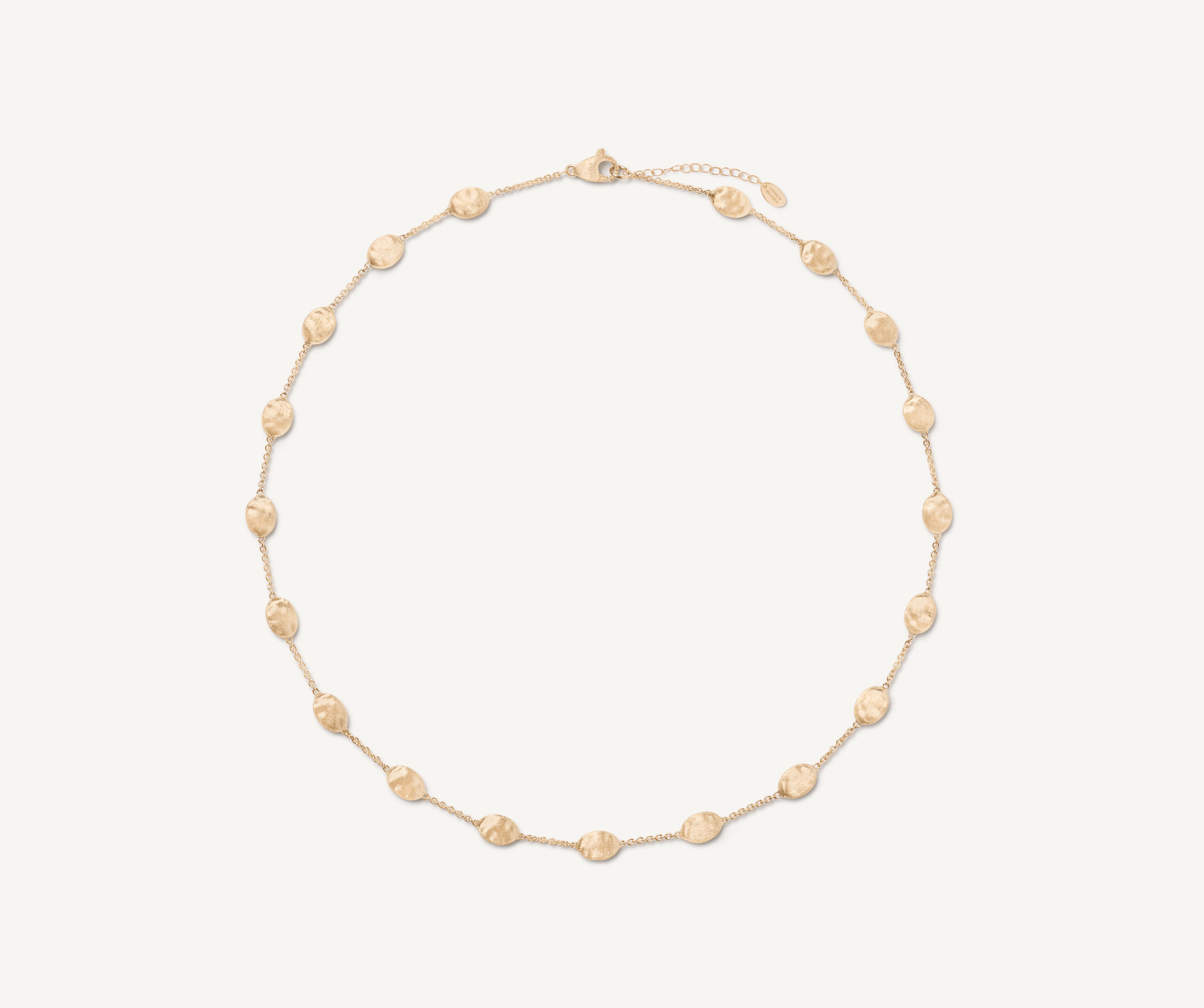 Gold necklace with mini oval elements