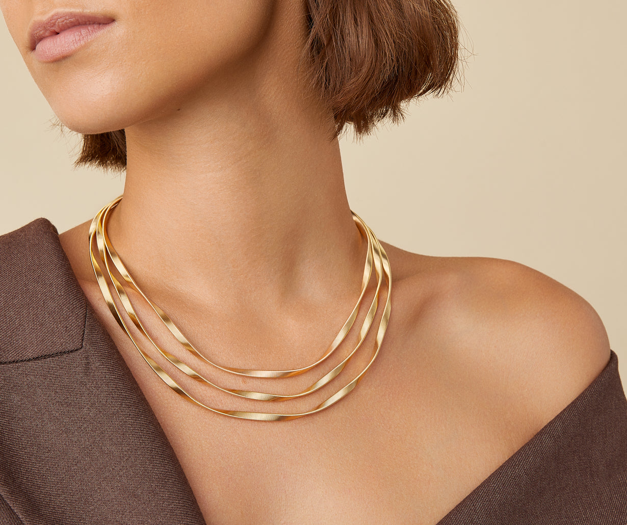 Three-strand gold necklace, Supreme