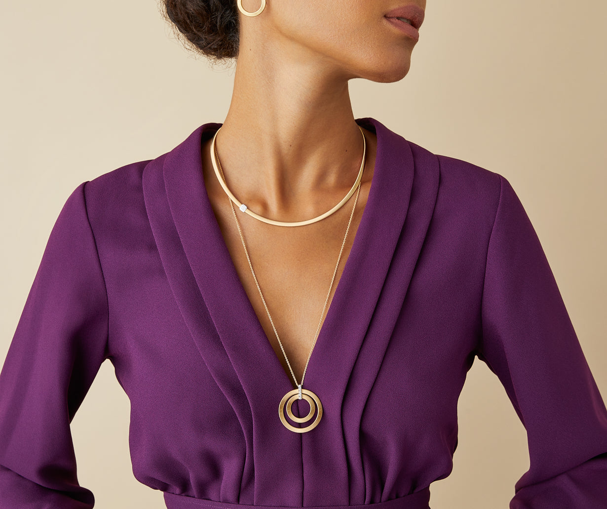 Long two-loop pendant with diamonds