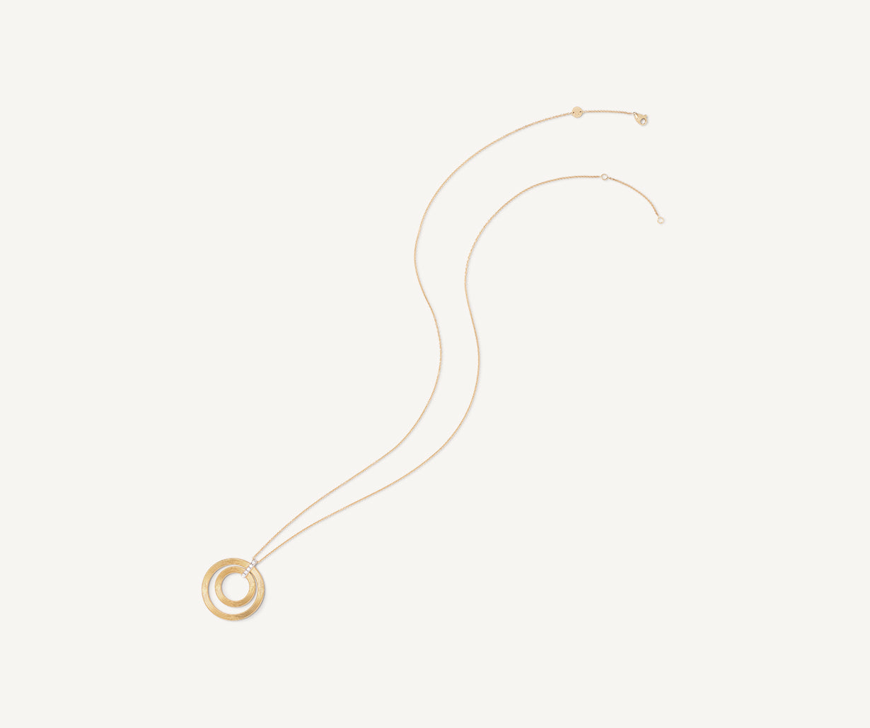 Long two-loop pendant with diamonds