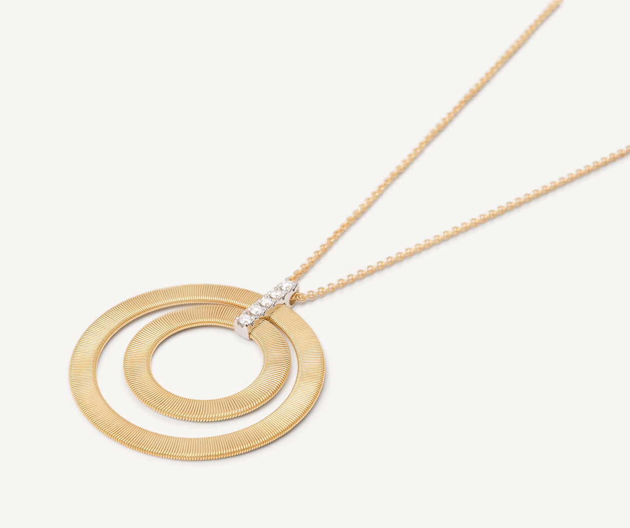 Long two-loop pendant with diamonds