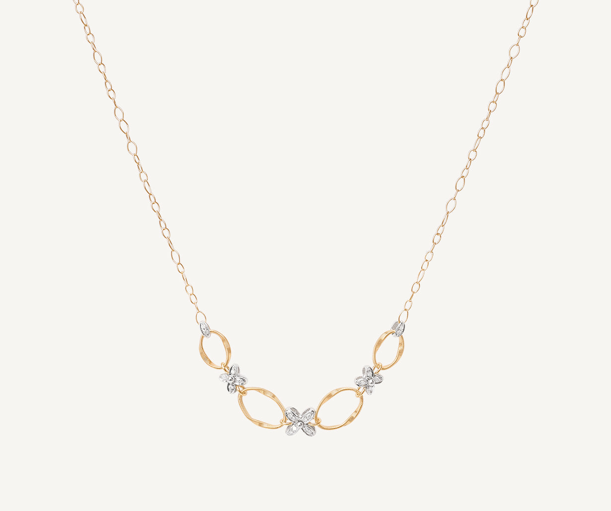 Gold chain necklace with floral diamond elements