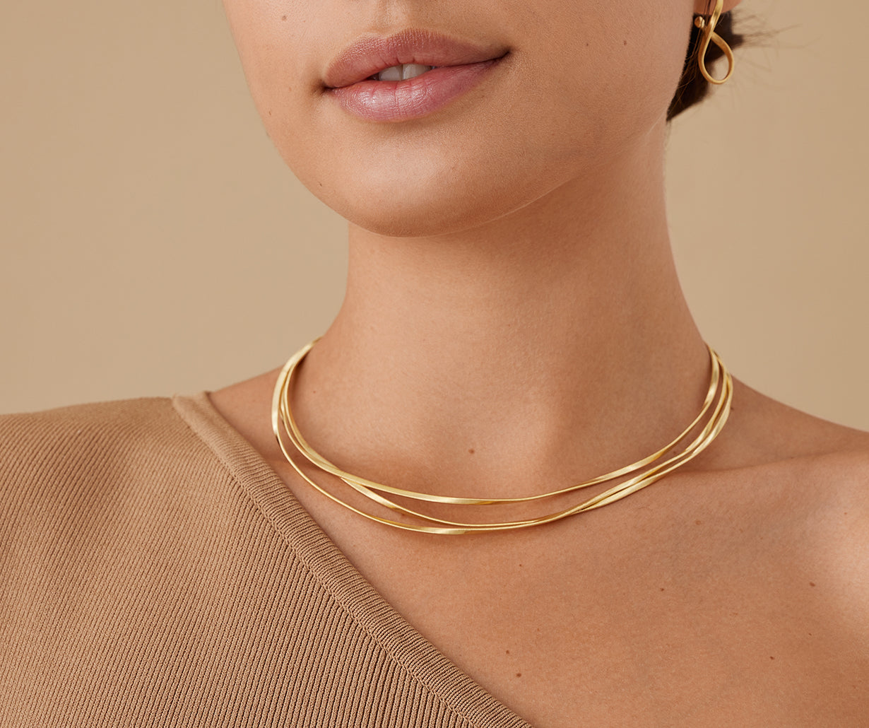 18kt yellow gold three-strand coil necklace