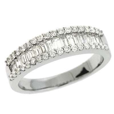 This Fashion Ring is available in 14K White Gold. There are a total of 52 stones. There are Baguette with a total carat weight of 0.56 set in a  setting.There are Rounds stones with a total carat weight of 0.3 set in a .