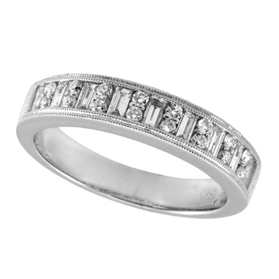 This Fashion Ring is available in 14K White Gold. There are a total of 25 stones. There are Baguette with a total carat weight of 0.37 set in a  setting.There are Rounds stones with a total carat weight of 0.17 set in a .