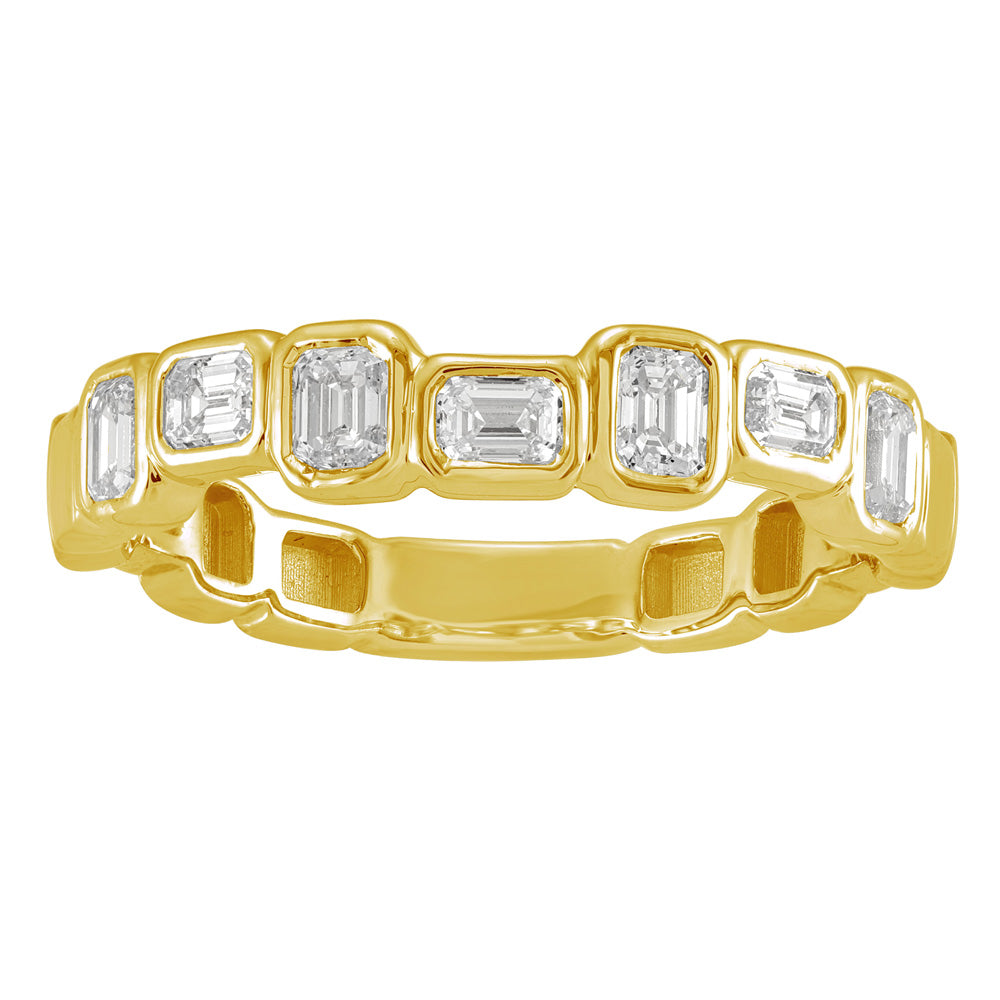 This Fashion Ring is available in 14K Yellow Gold. There are a total of 7 stones. There are Emerald Cut with a total carat weight of 0.64 set in a Bezel Set setting.