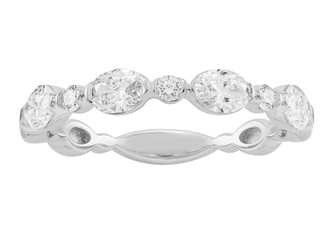 This Fashion Ring is available in 14K White Gold. There are a total of 7 stones. There are Marquise with a total carat weight of 0.62 set in a Shared Prongs setting.There are Rounds stones with a total carat weight of 0.08 set in a Shared Prongs.