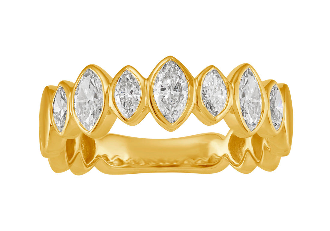 This Fashion Ring is available in 14K Yellow Gold. There are a total of 7 stones. There are Marquise with a total carat weight of 0.8 set in a Bezel Set setting.