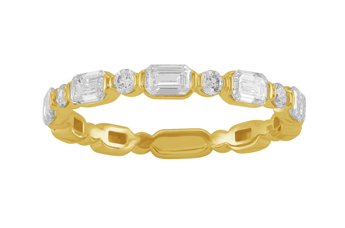 This Fashion Ring is available in 14K Yellow Gold. There are a total of 9 stones. There are Emerald Cut with a total carat weight of 0.74 set in a Bezel Set setting.There are Rounds stones with a total carat weight of 0.12 set in a Bezel Set.