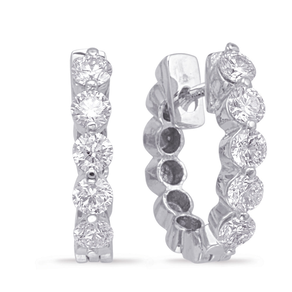 This Earring is available in 14K White Gold. There are a total of 10 stones. There are Rounds with a total carat weight of 1 set in a Prong Set|Shared Prongs setting.