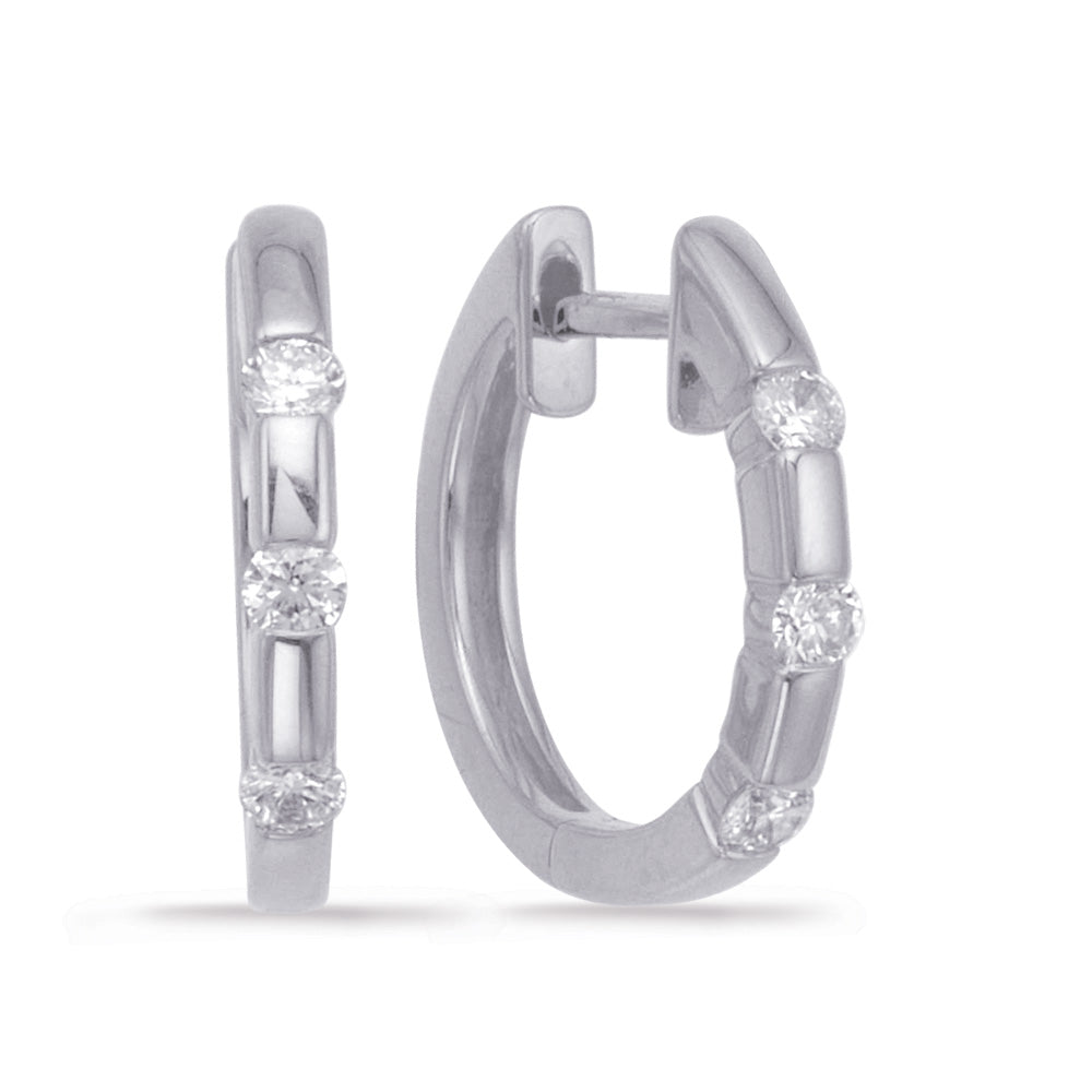This Earring is available in 14K White Gold. There are a total of 6 stones. There are Rounds with a total carat weight of 0.27 set in a Channel Set setting.