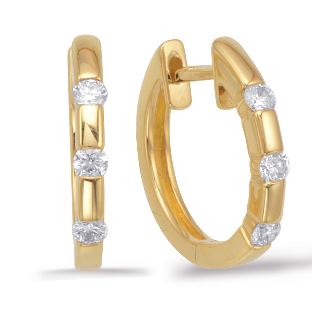 This Earring is available in 14K Yellow Gold. There are a total of 6 stones. There are Rounds with a total carat weight of 0.27 set in a Channel Set setting.