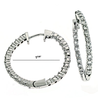 This Earring is available in 14K White Gold. There are a total of 50 stones. There are Rounds with a total carat weight of 1.07 set in a  setting.
