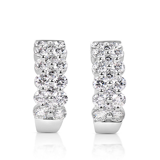 This Earring is available in 14K White Gold. There are a total of 34 stones. There are Rounds with a total carat weight of 1.8 set in a Shared Prongs setting.