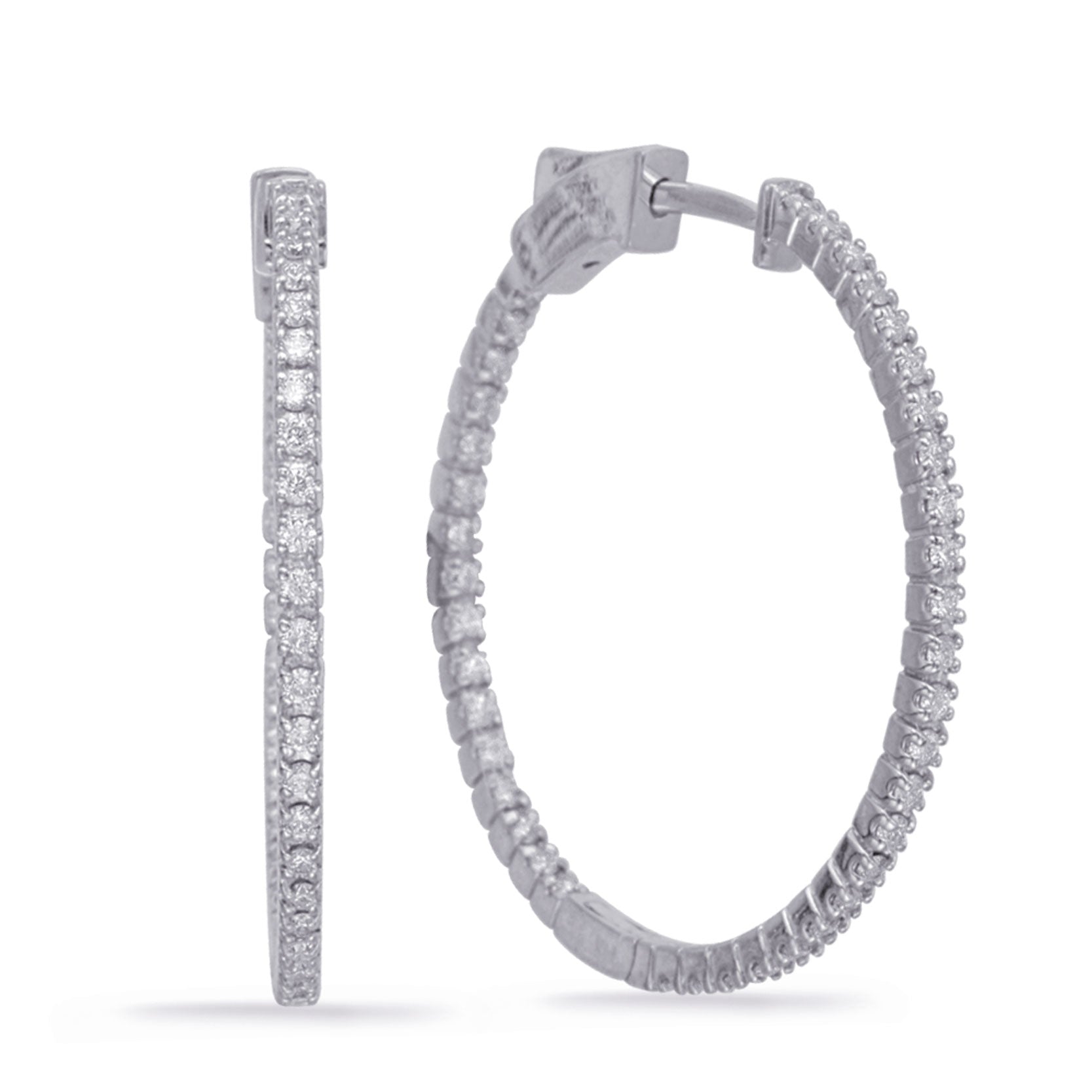 This Earring is available in 14K White Gold. There are a total of 80 stones. There are Rounds with a total carat weight of 0.68 set in a Prong Set setting.