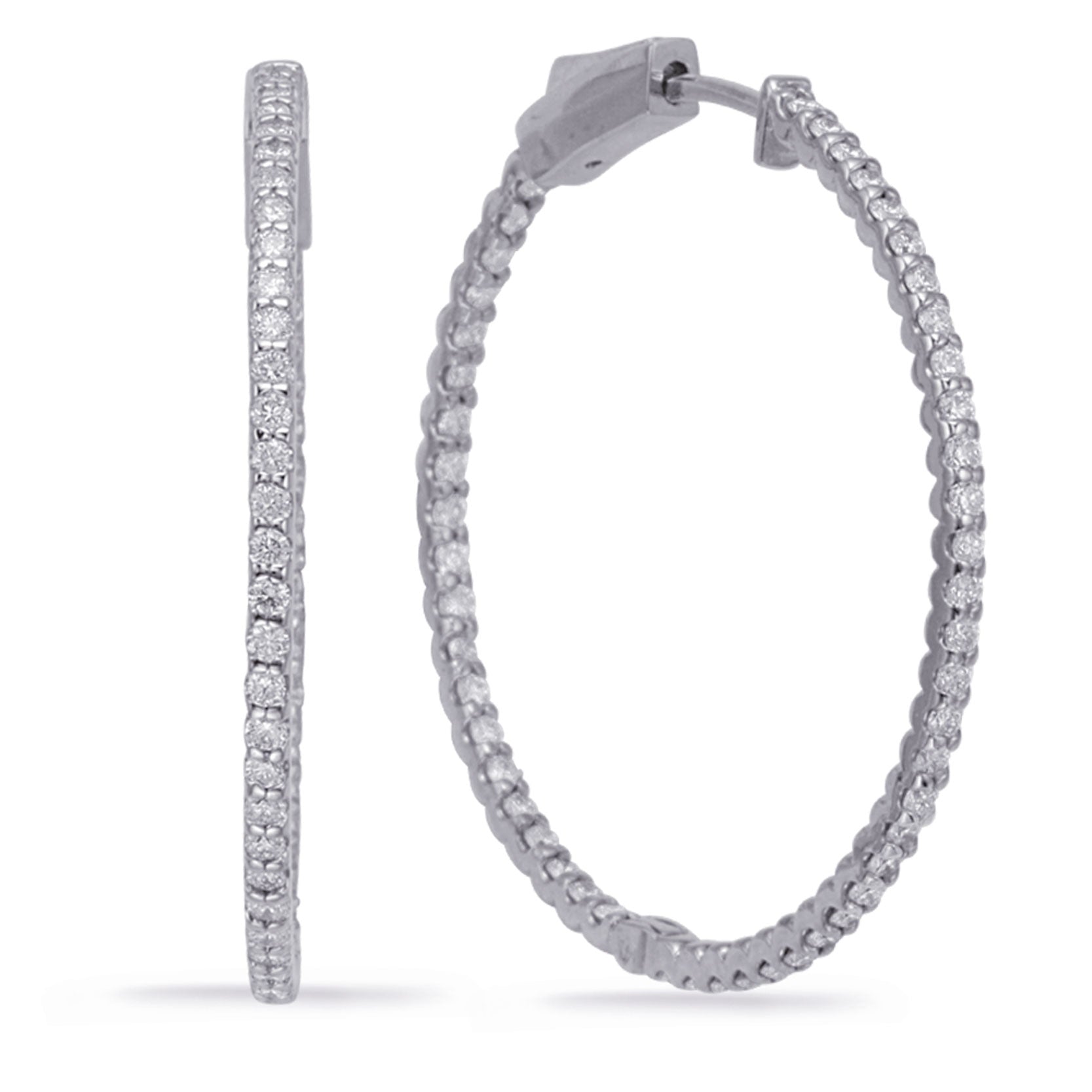 This Earring is available in 14K White Gold. There are a total of 100 stones. There are Rounds with a total carat weight of 1.04 set in a Prong Set setting.