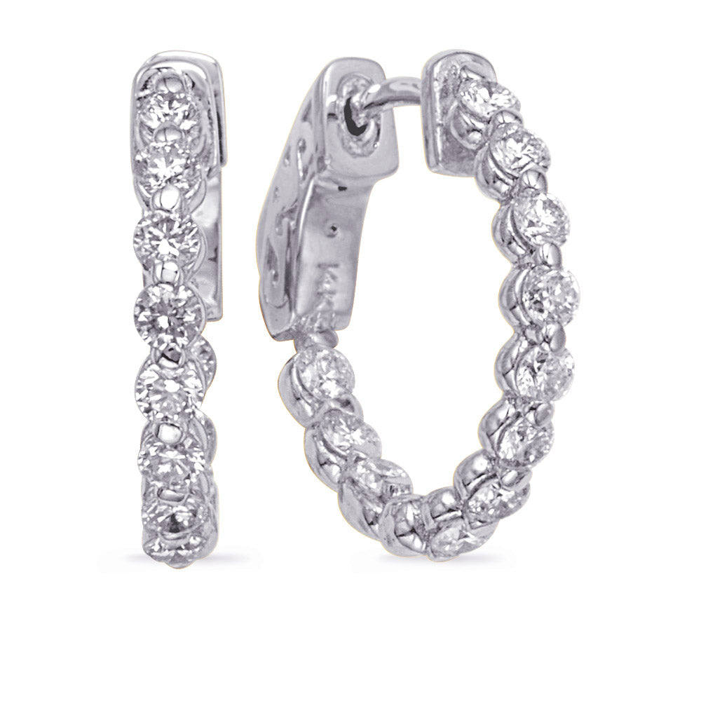 This Earring is available in 14K White Gold. There are a total of 22 stones. There are Rounds with a total carat weight of 1.08 set in a  setting.