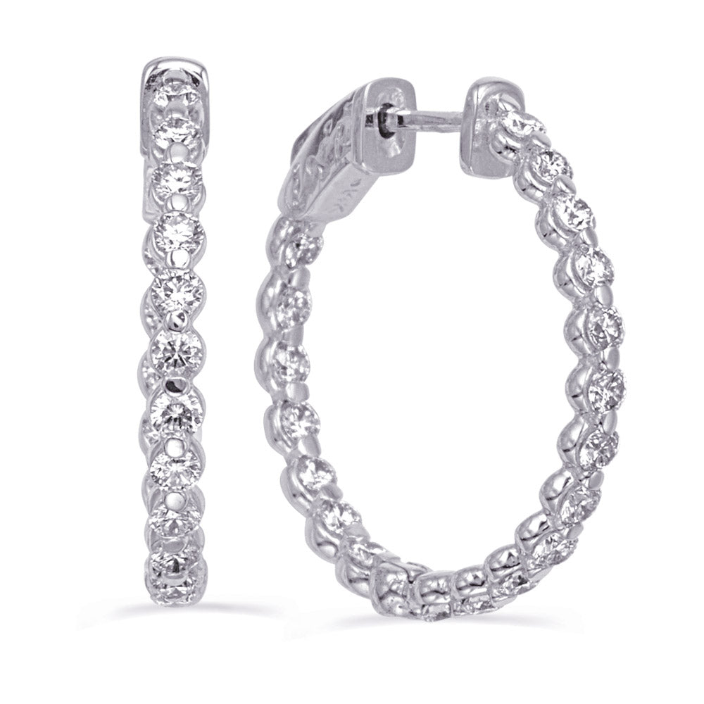 This Earring is available in 14K White Gold. There are a total of 38 stones. There are Rounds with a total carat weight of 1.56 set in a  setting.