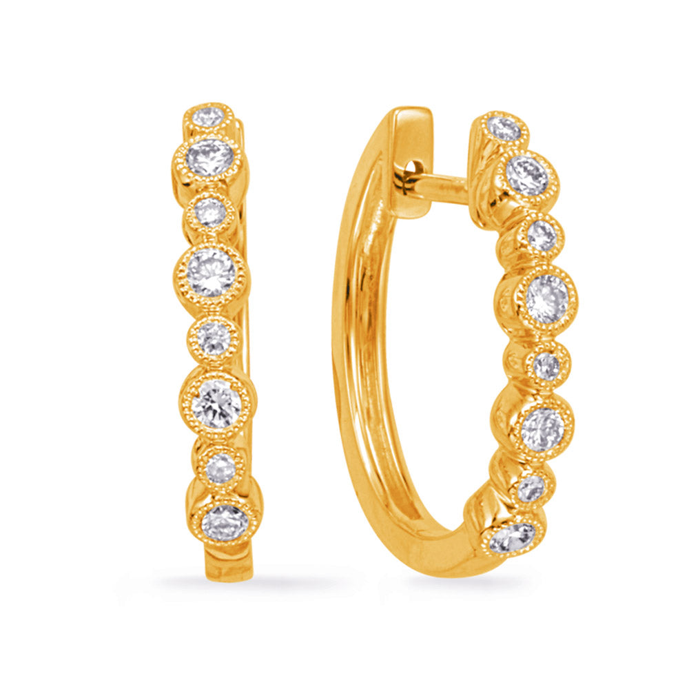 This Earring is available in 14K Yellow Gold. There are a total of 16 stones. There are Rounds with a total carat weight of 0.35 set in a Bezel Set setting.