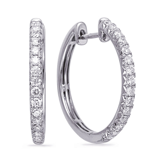 This Earring is available in 14K White Gold. There are a total of 30 stones. There are Rounds with a total carat weight of 0.59 set in a  setting.