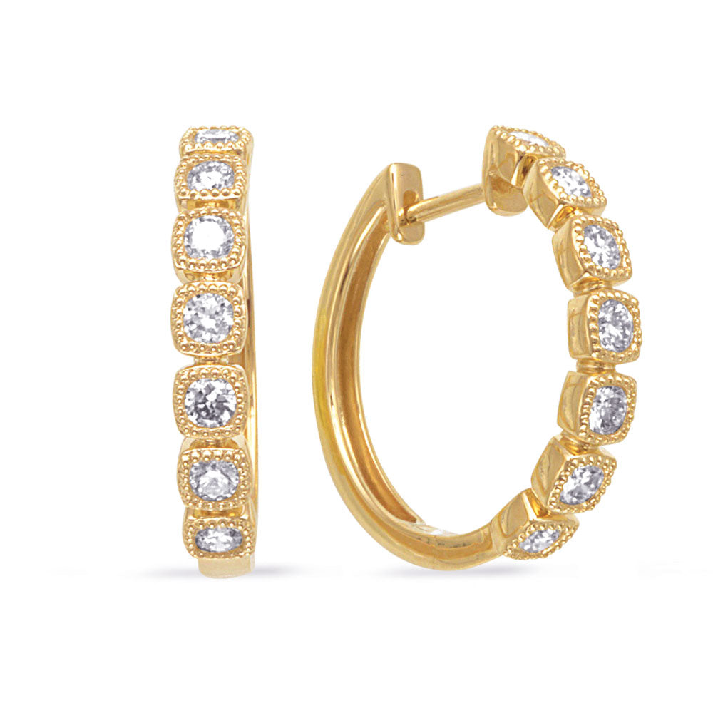 This Earring is available in 14K Yellow Gold. There are a total of 14 stones. There are Rounds with a total carat weight of 0.65 set in a Micro Prong setting.