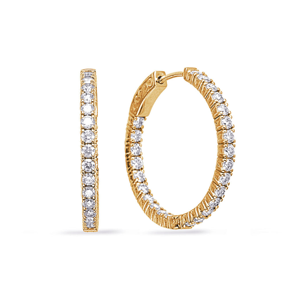 This Earring is available in 14K Yellow Gold. There are a total of 50 stones. There are Rounds with a total carat weight of 1.48 set in a Micro Prong setting.