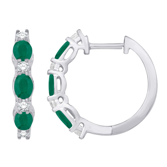 This Earring is available in 14K White Gold. There are a total of 14 stones. There are Emerald with a total carat weight of 0.7 set in a Micro Prong|Prong Set setting.There are Rounds stones with a total carat weight of 0.22 set in a Micro Prong|Prong Set.