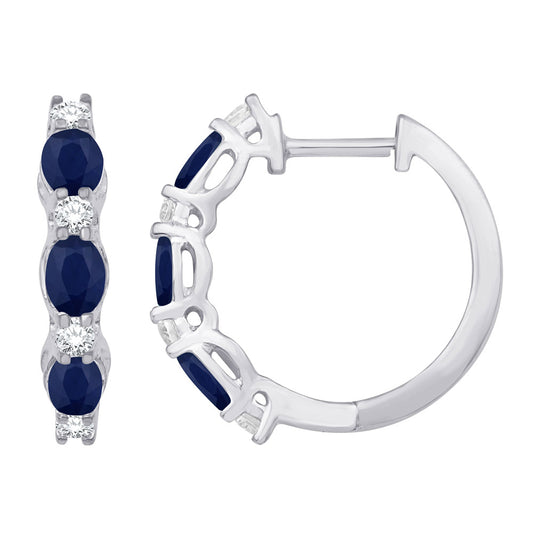 This Earring is available in 14K White Gold. There are a total of 14 stones. There are Rounds with a total carat weight of 0.22 set in a Micro Prong|Prong Set setting.There are Sapphire stones with a total carat weight of 1.17 set in a Micro Prong|Prong Set.