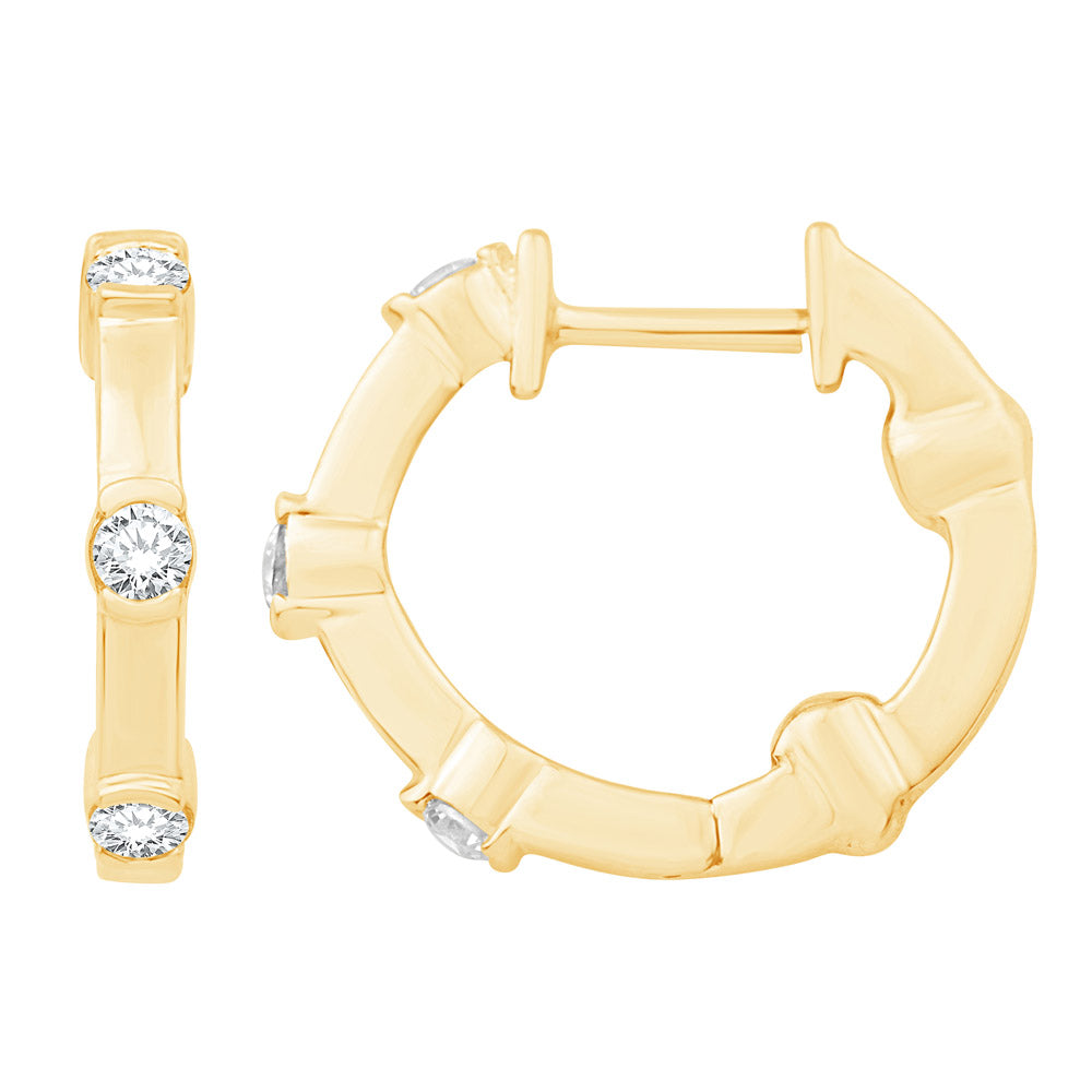 This Earring is available in 14K Yellow Gold. There are a total of 6 stones. There are Rounds with a total carat weight of 0.3 set in a Channel Set setting.