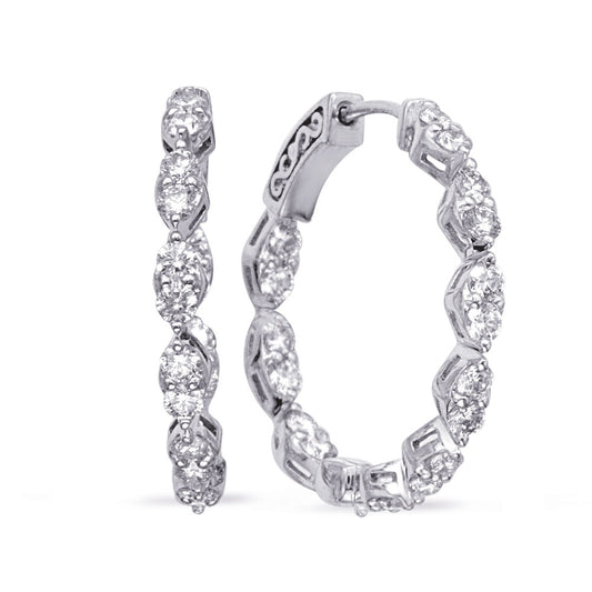 This Earring is available in 14K White Gold. There are a total of 36 stones. There are Rounds with a total carat weight of 1.8 set in a Shared Prongs setting.