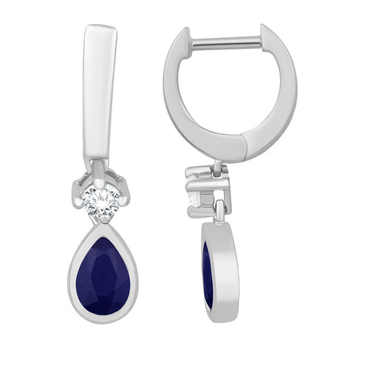 This Earring is available in 14K White Gold. There are a total of 4 stones. There are Rounds with a total carat weight of 0.15 set in a Bezel Set|Micro Prong setting.There are Sapphire stones with a total carat weight of 0.86 set in a Bezel Set|Micro Prong.