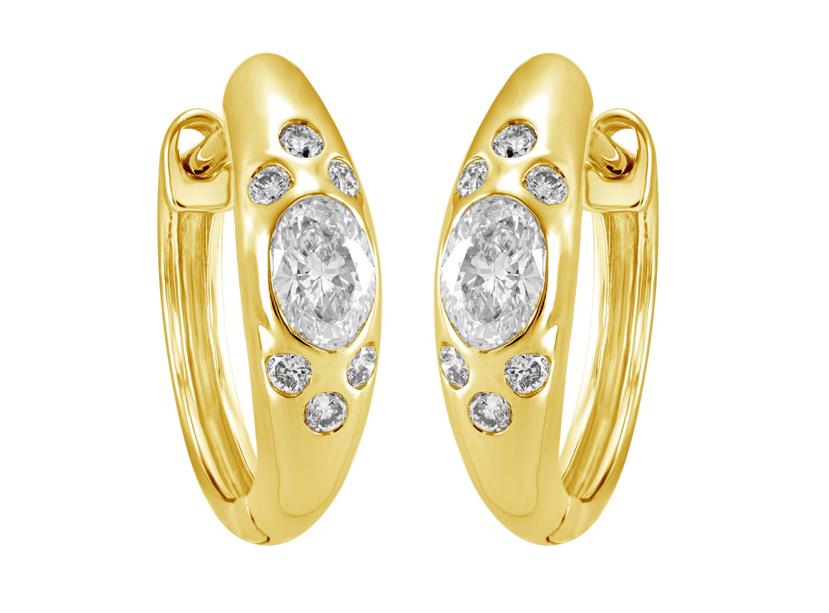 This Earring is available in 14K Yellow Gold. There are a total of 14 stones. There are Oval with a total carat weight of 0.39 set in a Bezel Set setting.There are Rounds stones with a total carat weight of 0.14 set in a Bezel Set.