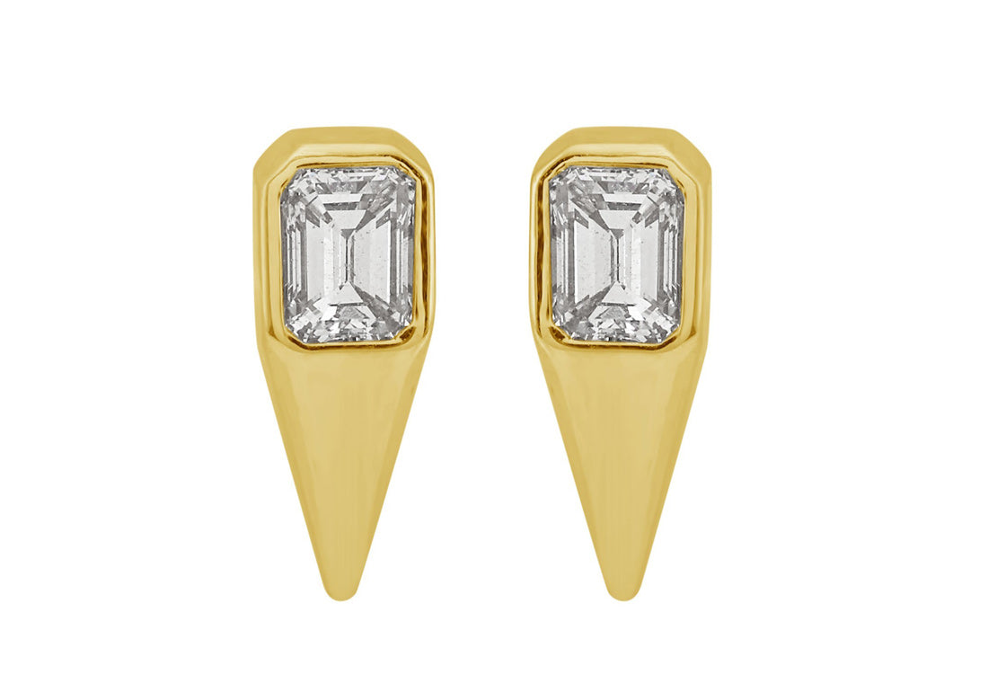 This Earring is available in 14K Yellow Gold. There are a total of 2 stones. There are Emerald Cut with a total carat weight of 0.32 set in a Bezel Set setting.