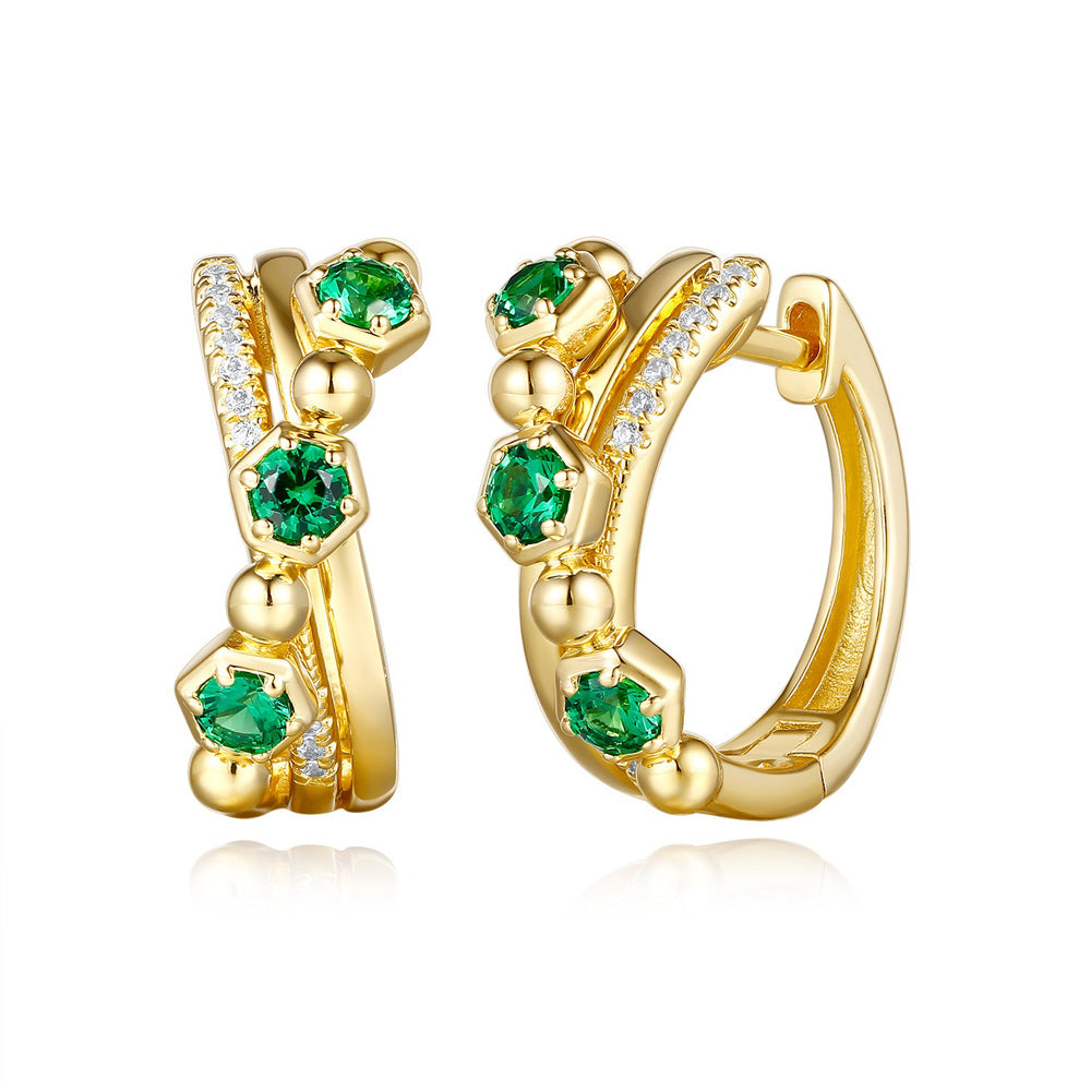 This Earring is available in 14K Yellow Gold. There are a total of 28 stones. There are Emerald with a total carat weight of 0.39 set in a Micro Prong|Prong Set setting.There are Rounds stones with a total carat weight of 0.07 set in a Micro Prong|Prong Set.
