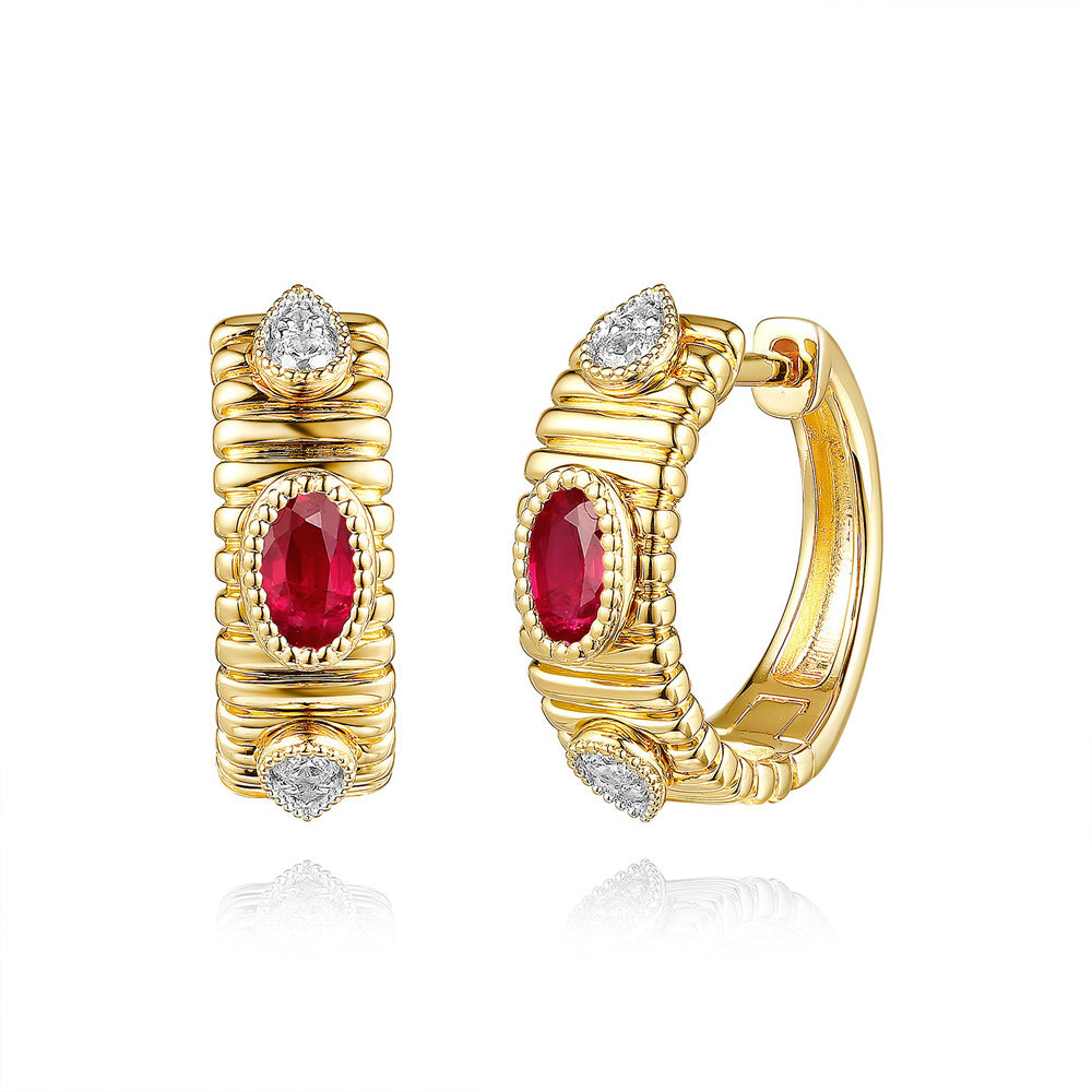 This Earring is available in 14K Yellow Gold. There are a total of 10 stones. There are Rounds with a total carat weight of 0.12 set in a Bezel Set|Micro Prong setting.There are Ruby stones with a total carat weight of 0.62 set in a Bezel Set|Micro Prong.