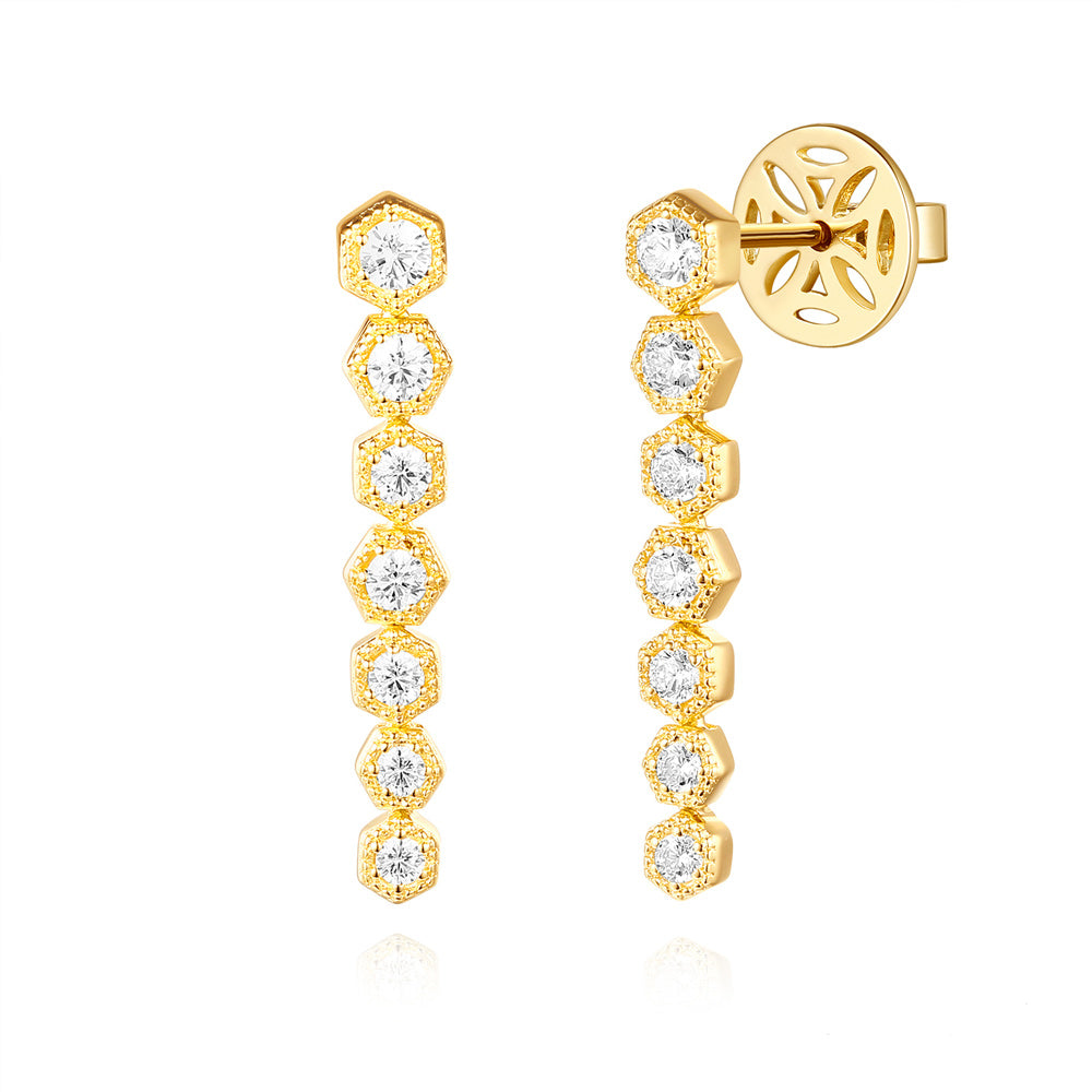 This Earring is available in 14K Yellow Gold. There are a total of 14 stones. There are Rounds with a total carat weight of 0.6 set in a Prong Set setting.