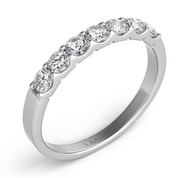 This Band is available in 14K White Gold. There are a total of 7 stones. There are Round with a total carat weight of 0.51 set in a Prong Set setting.