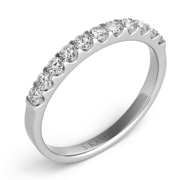 This Band is available in 14K White Gold. There are a total of 11 stones. There are Round with a total carat weight of 0.43 set in a Prong Set setting.