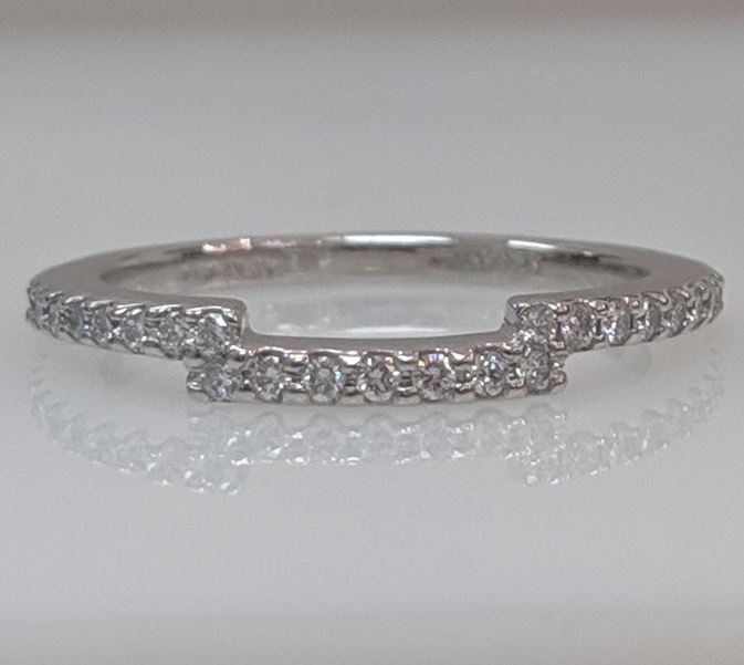 This Band is available in 14K White Gold. There are a total of 31 stones. There are Round with a total carat weight of 0.27 set in a Micro Prong setting.