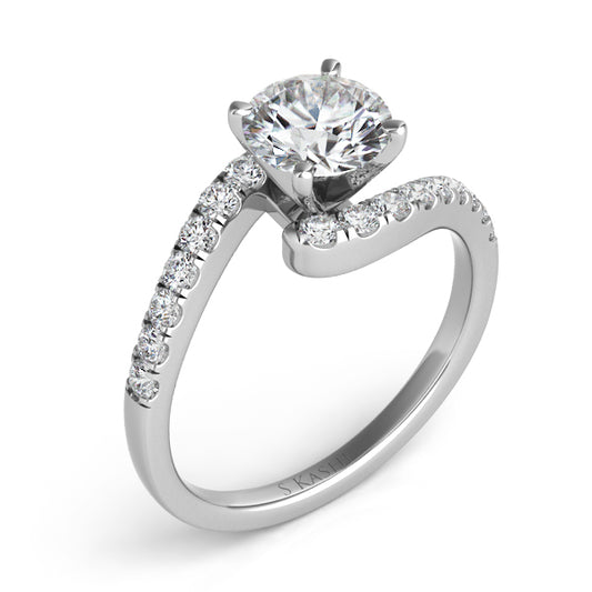 This Engagement Ring  is available in 14K White Gold. There are a total of 18 stones. There are Rounds with a total carat weight of 0.39 set in a Prong Set setting.